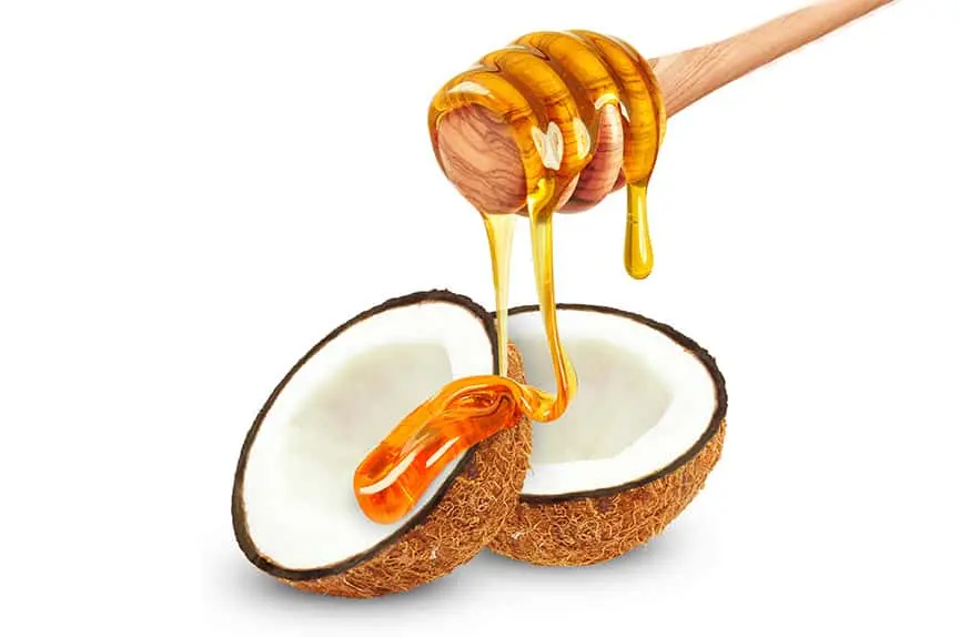 Coconut trecle pouring to a coconut half